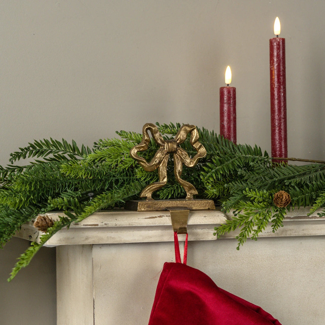 PETITE GOLD BOW STOCKING HOLDER
